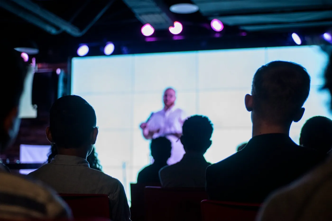 Audience seated in a conference session